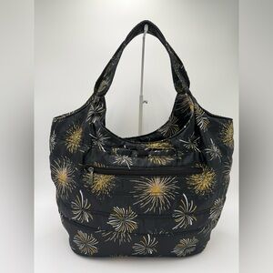 Lug Gondola SE Tote Bag in a black and gold fireworks pattern